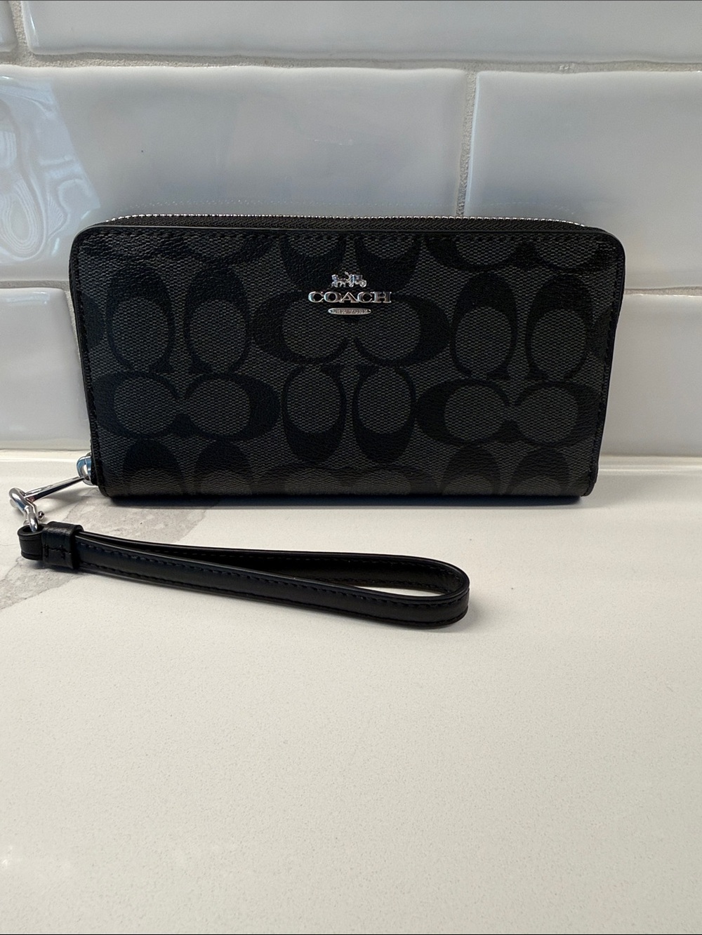 Coach Black Signature Zip Wristlet with Leather Strap